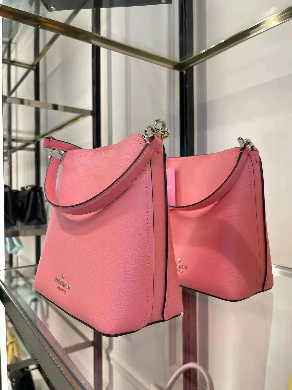 WKR00439 Peach in Kate bag Spade bucket small darcy Nectar